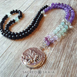 Crystals for anxiety included in the Emotional Freedom Mala by Sacred Skaia are amethyst, fluorite, clear quartz and labradorite or sandalwood. Also for use with EFT healing.