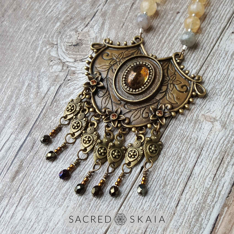 Closeup of pendant. Citrine, pyrite and labradorite are the abundance manifesting crystals also used in the Abundant Success Mala from Sacred Skaia.