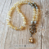Crystals for abundance include citrine, pyrite and labradorite in the Abundant Success Half Mala from Sacred Skaia.