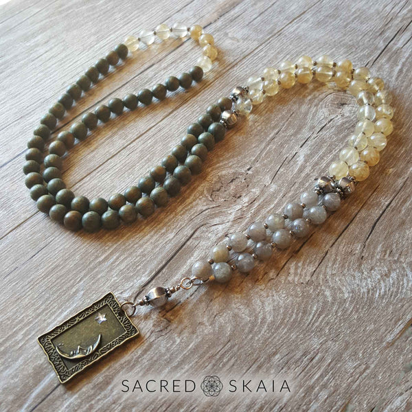 Crystals for abundance included in the Magical Abundance Mala by Sacred Skaia are citrine, labradorite, pyrite and sandalwood. 